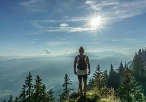 person on top of the mountain